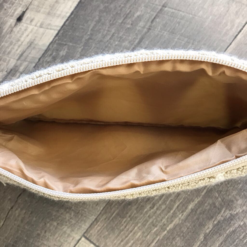 BEIGE TASSLE CLUTCH