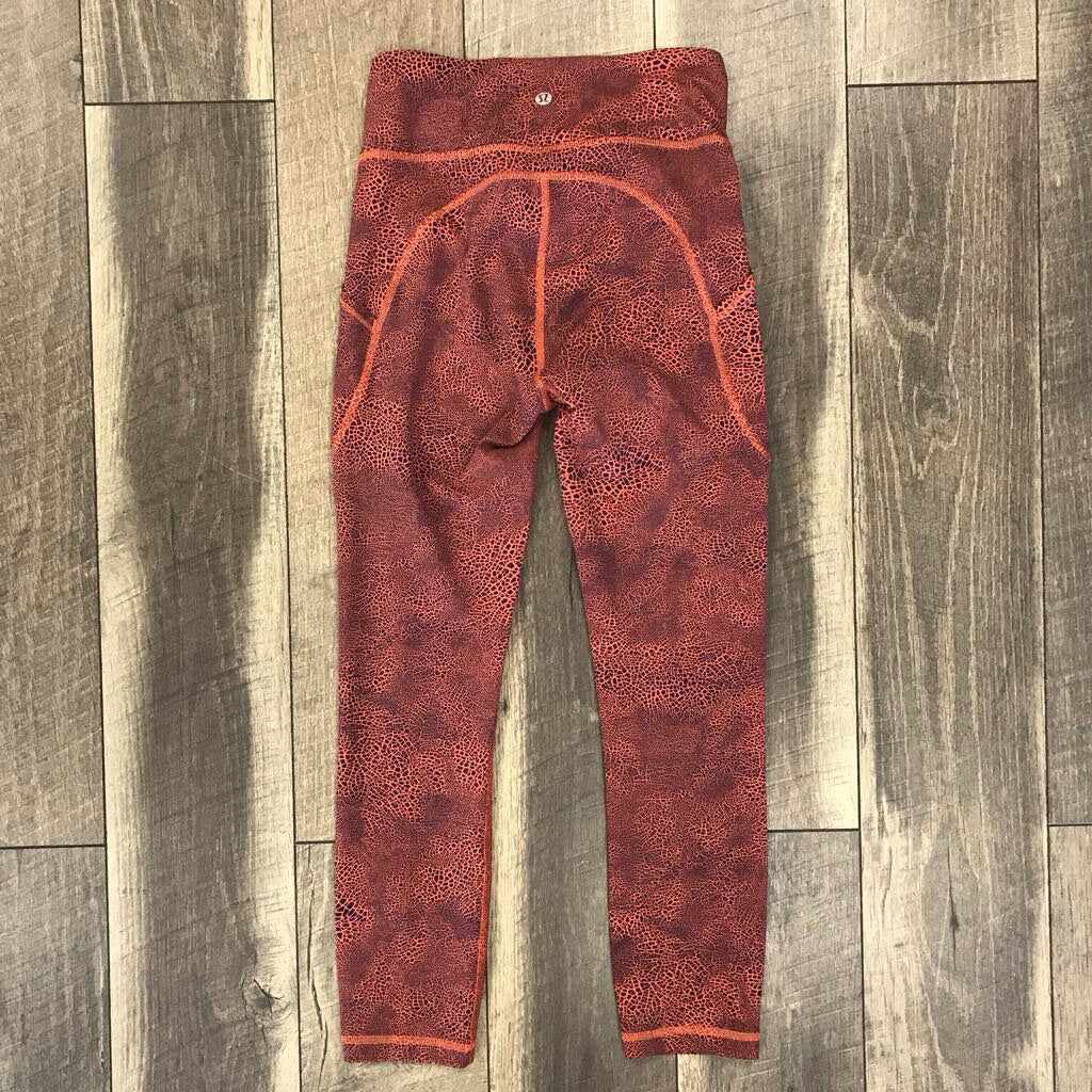 ORANGE CRACKLE LEGGINGS