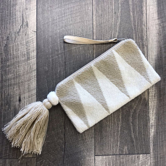 BEIGE TASSLE CLUTCH